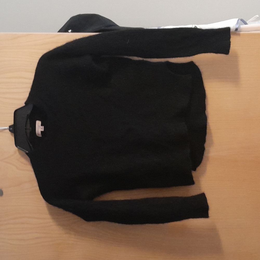 Black cashmere sweater.